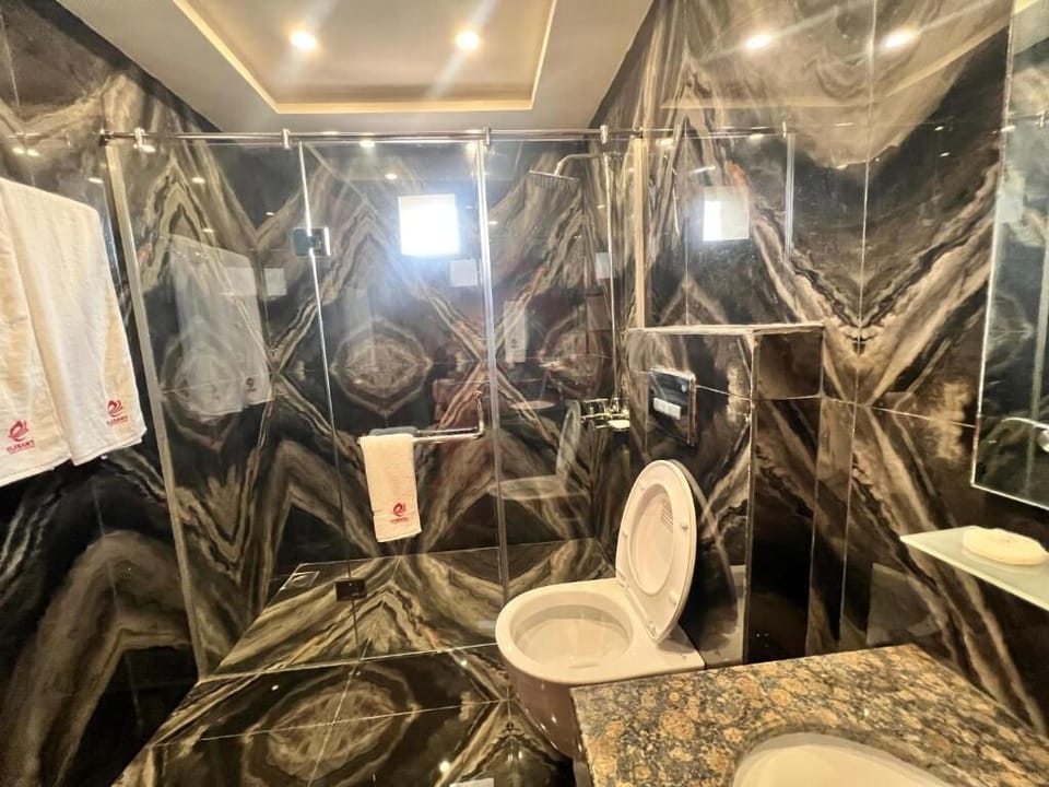 Deluxe Double Room | Bathroom | Shower, designer toiletries, hair dryer, bathrobes