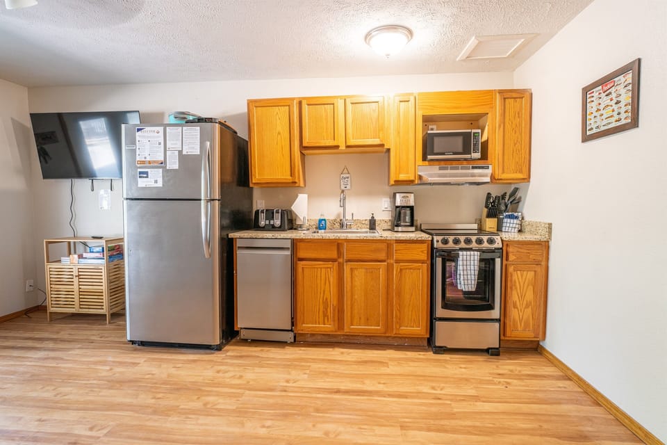 Well-stocked kitchen with new appliances