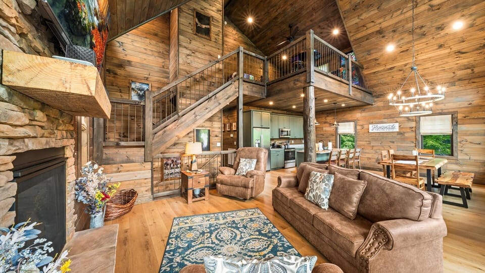 A gorgeous wooden staircase leads to the second level