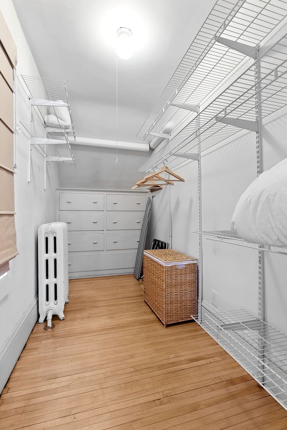Your spacious walk-in closet features organized shelving, drawers, and hanging space to keep your belongings perfectly arranged throughout your stay.