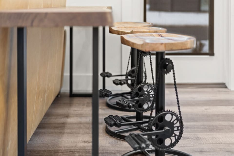 Bar Area: Unique bike pedal stools add a fun twist to your gathering space in Whitefish!