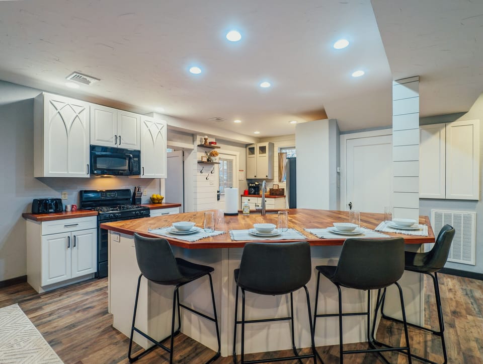 Open Concept Living, Dining & Kitchen w/ Formal Dining Table & Island