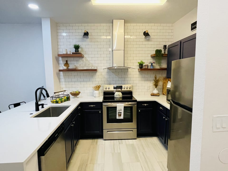 NEW Fully equipped HUGE Kitchen w/ SS appliances & luxurious quartz countertops!