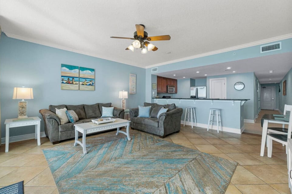 Oceanfront Living Area with Flat Screen TV, Sleeper Sofa and Private Balcony Access