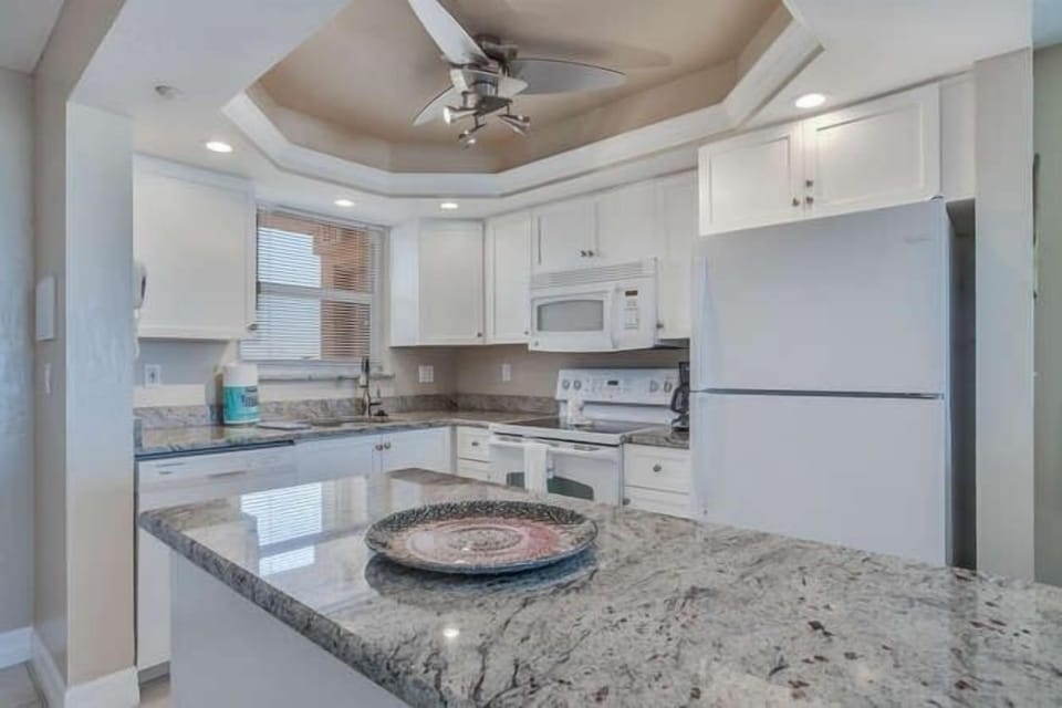 Condo, 2 Bedrooms | Private kitchen | Coffee/tea maker, fridge, oven, toaster