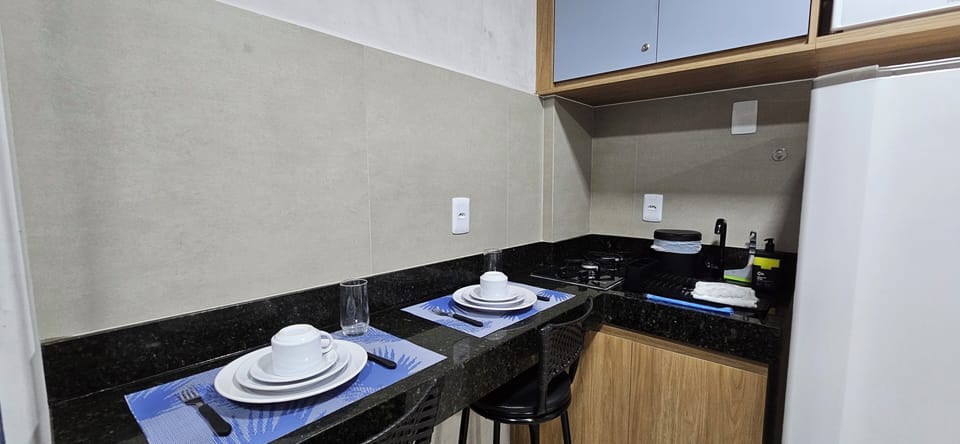 Fridge, microwave, cookware/dishes/utensils