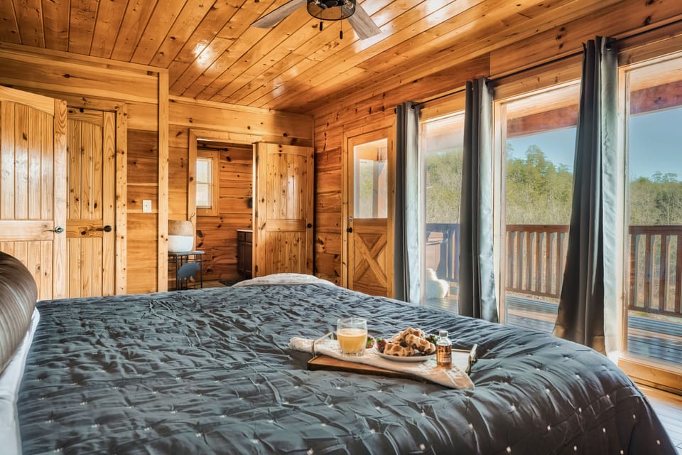 The Main floor Master Bedroom features a King Size bed & an in-suite bathroom.