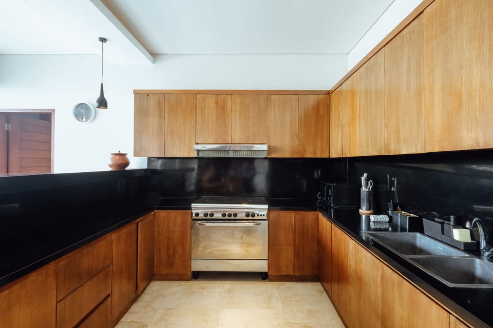 Villa | Private kitchen | Full-size fridge, oven, stovetop, dishwasher