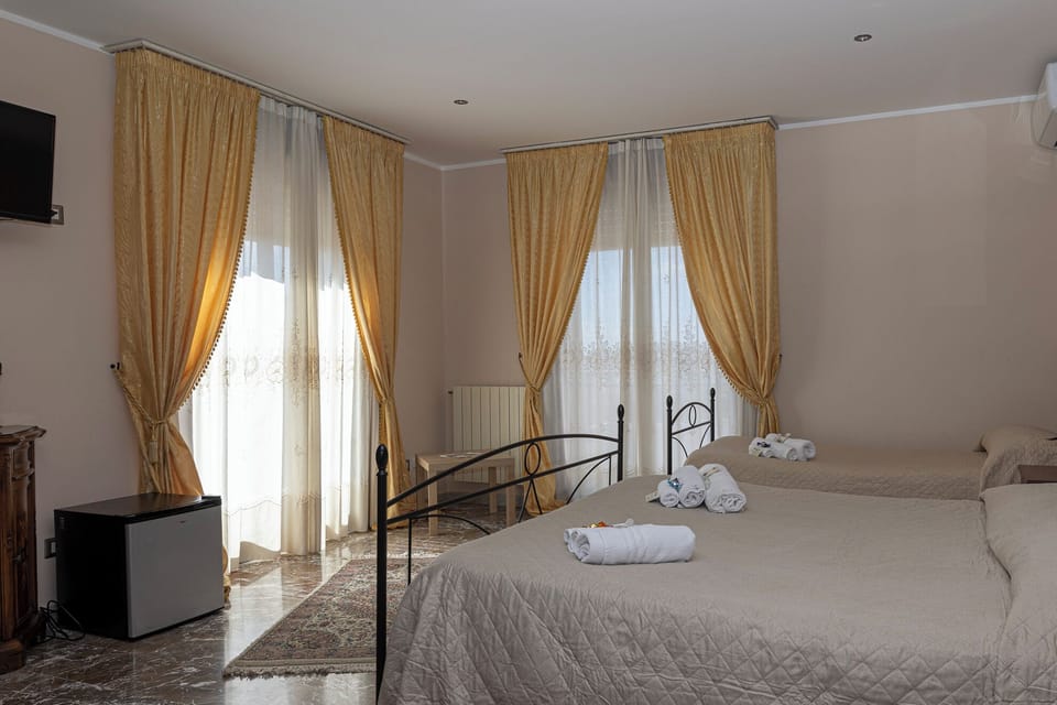 Comfort Quadruple Room | Premium bedding, desk, soundproofing, iron/ironing board