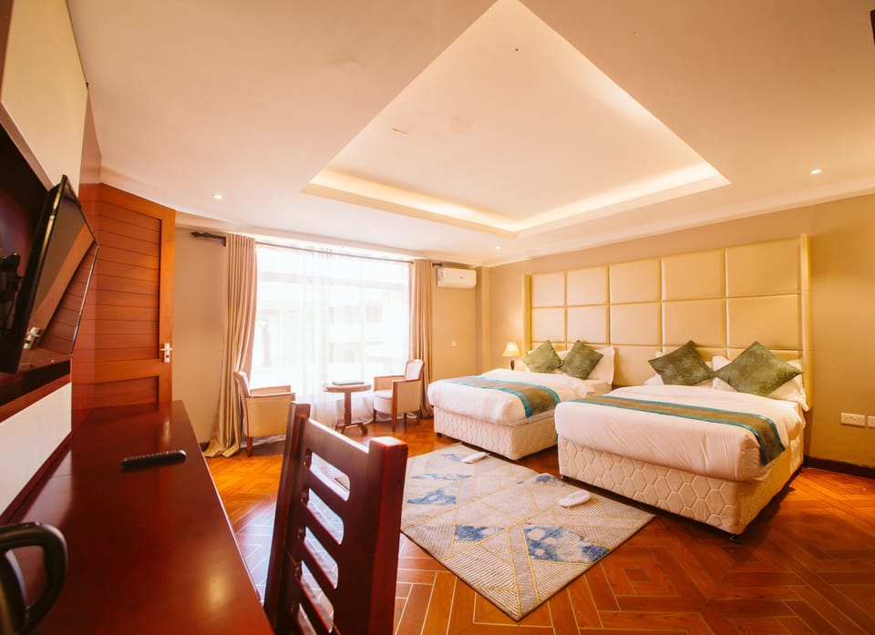 Executive Double or Twin Room | In-room safe, desk, laptop workspace, blackout drapes