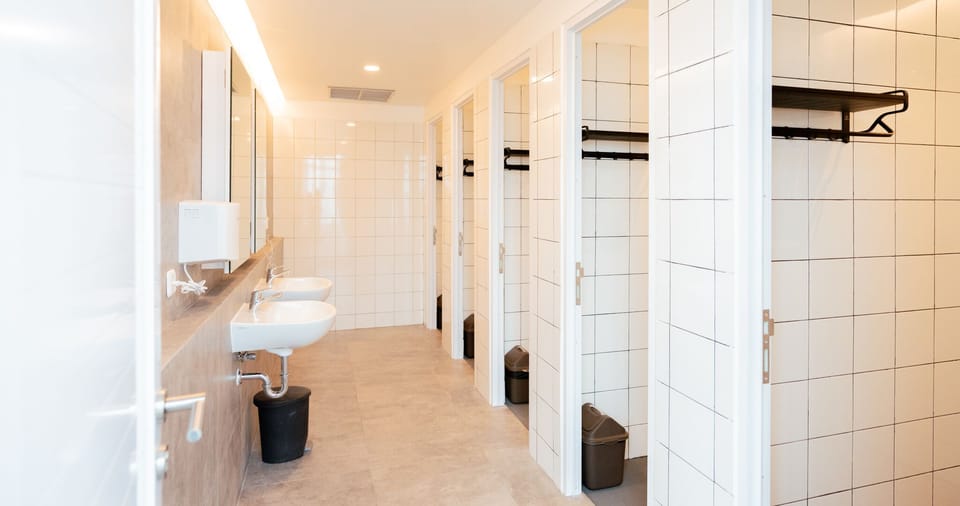 Shower, free toiletries, hair dryer, slippers