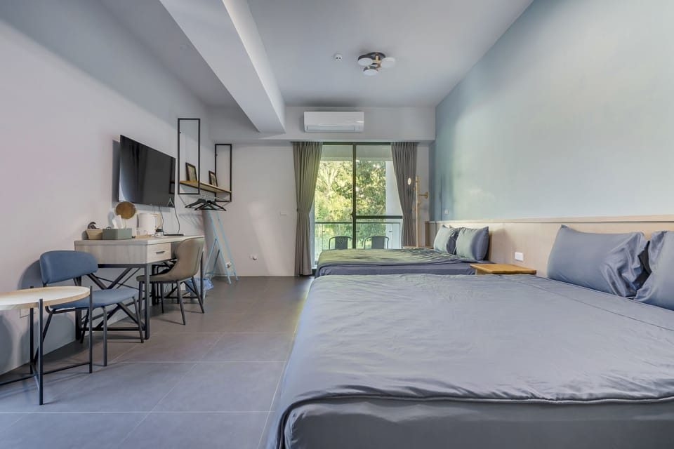 Quadruple Room with Mountain View | Blackout drapes, free WiFi, bed sheets