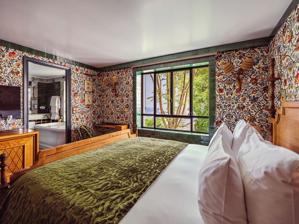 Deluxe Garden Room | Hypo-allergenic bedding, memory foam beds, minibar, in-room safe