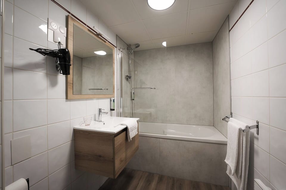 Hair dryer, towels, soap, shampoo