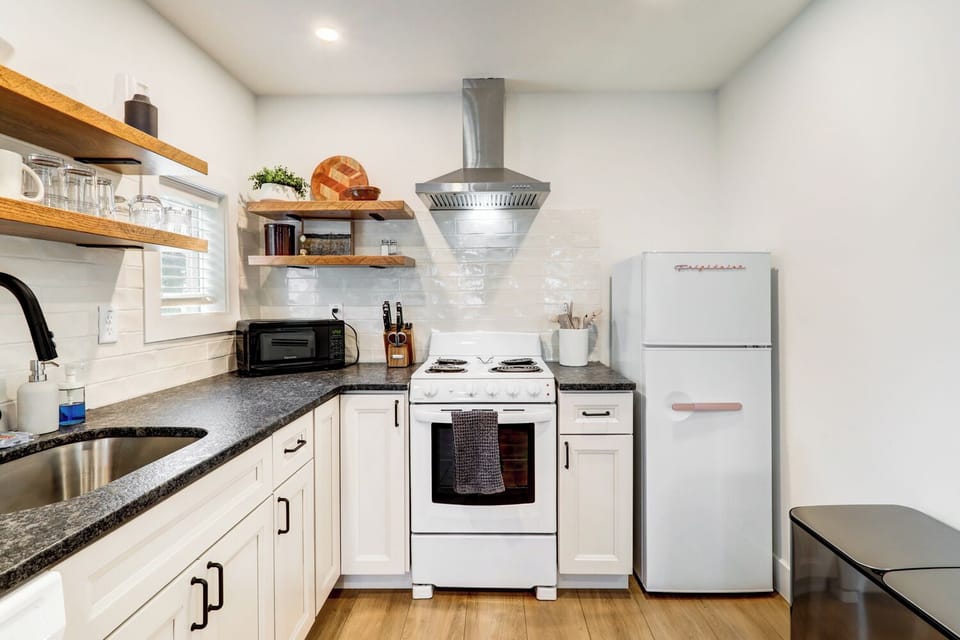 Fully stocked kitchen with essentials for cooking