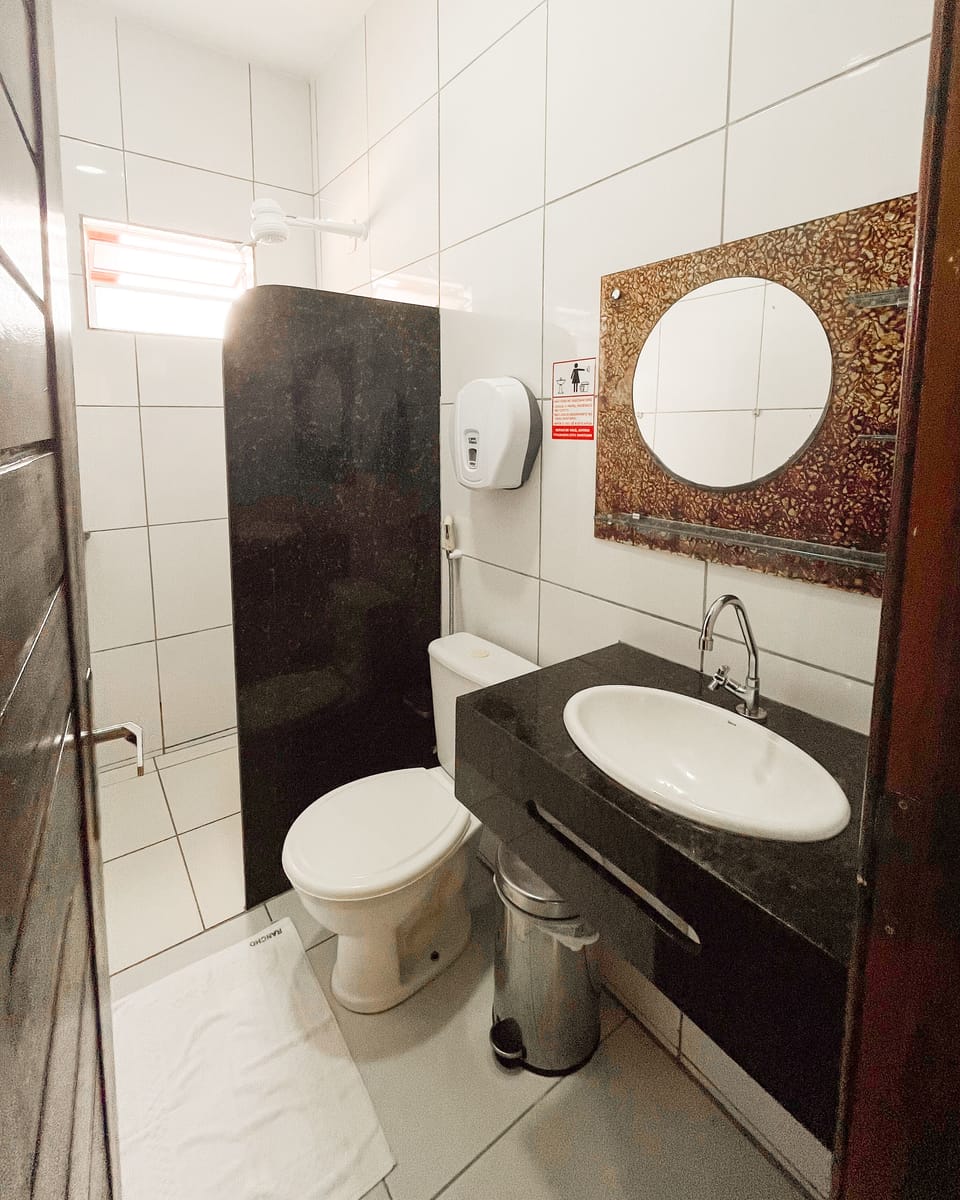 Shower, towels, soap, toilet paper