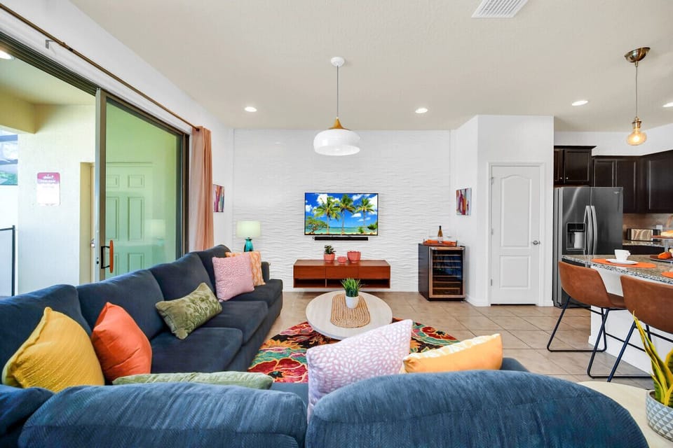 Our living room`s plush sectional invites you to unwind and make unforgettable family memories