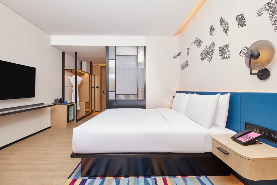 Premium bedding, down comforters, in-room safe, desk