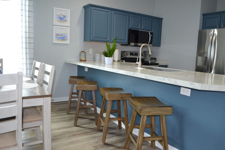4 additional barstools for seating 