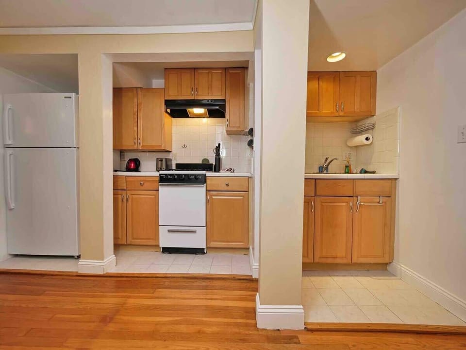 A straightforward kitchen setup with all the essentials for cooking at home.