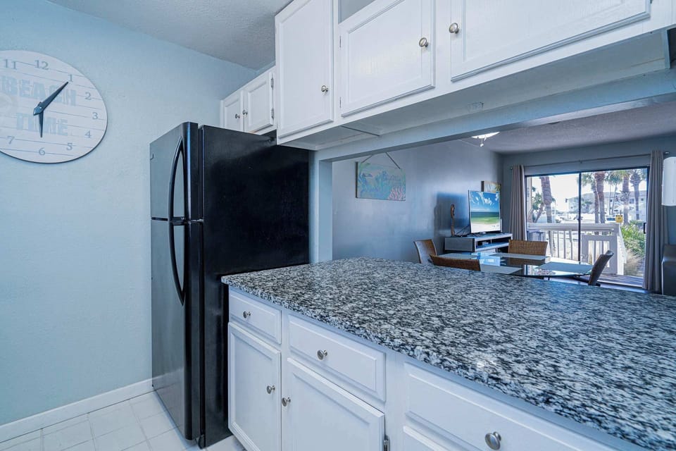Condo, Multiple Beds, Balcony (Beachfront Joy at Sandpiper Cove) | Private kitchen | Fridge, microwave, oven, stovetop
