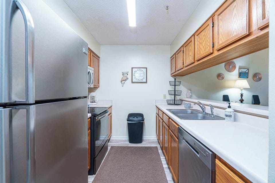 Condo, Multiple Beds, Balcony, Garden View (Fun Times) | Private kitchen | Fridge, microwave, oven, stovetop