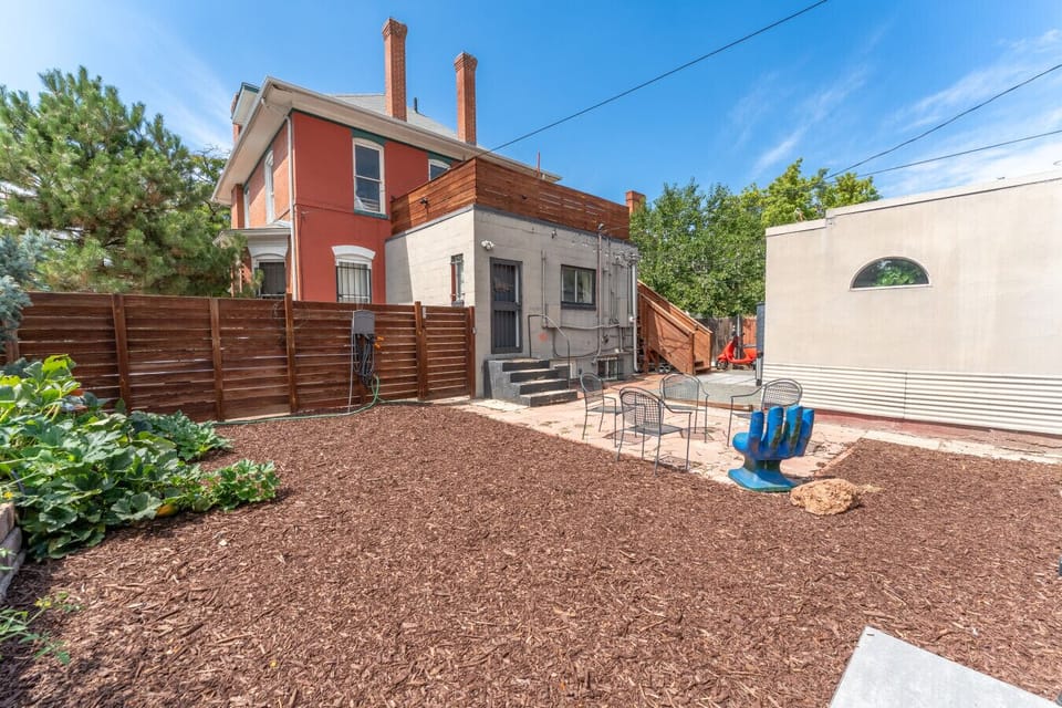 Shared backyard with seating and grill