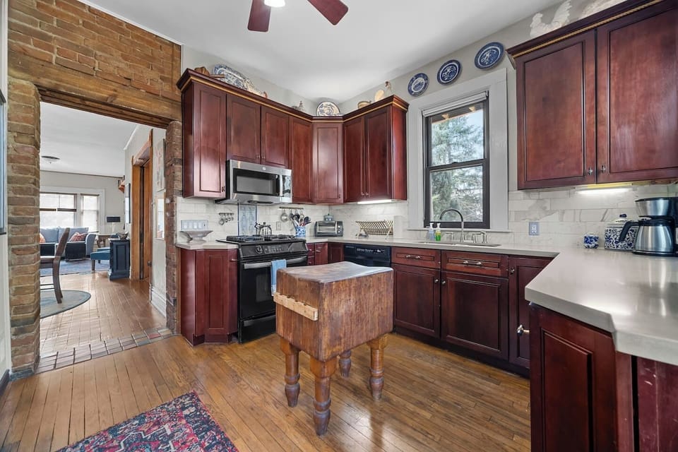 Fully equipped kitchen with walkout patio