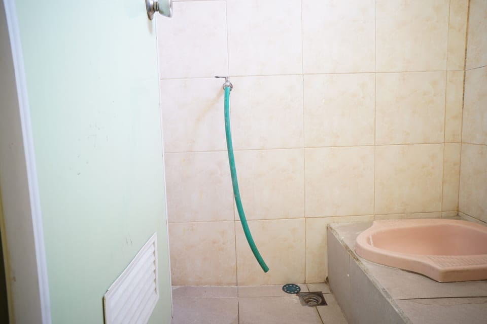 Basic Single Room | Bathroom | Shower, soap