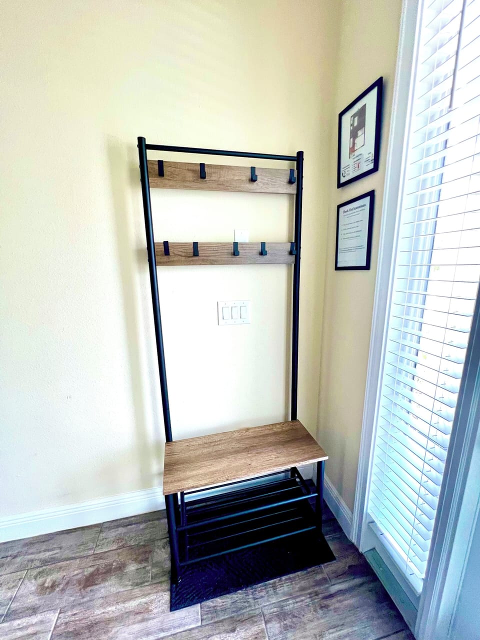 Entryway with coat/Shoe storage.