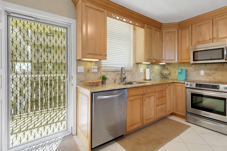 The kitchen comes well equipped with full-size, updated appliances.