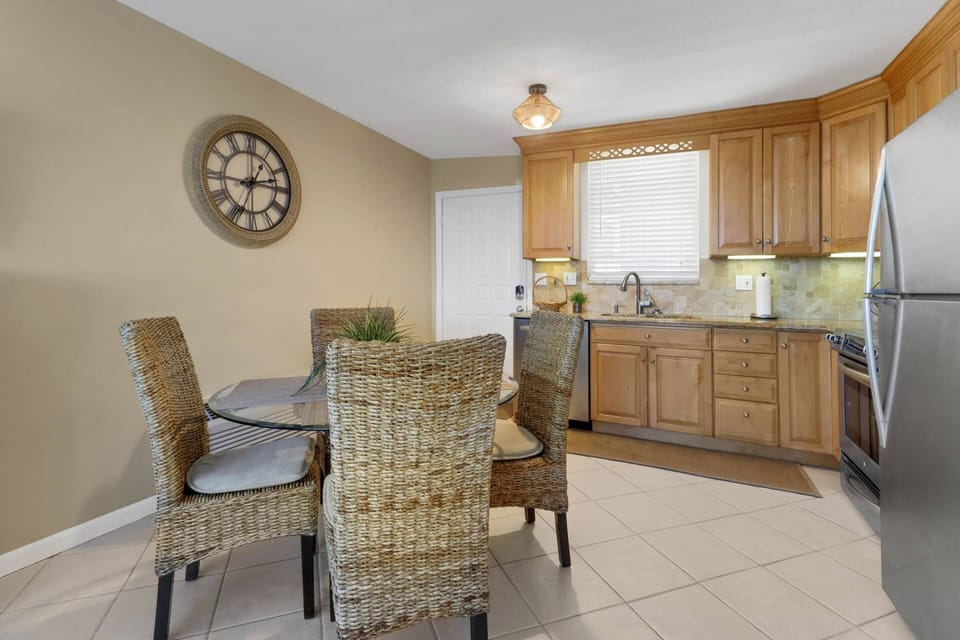 Enjoy your meals or a friendly game of cards gathered around the dining table for 4.