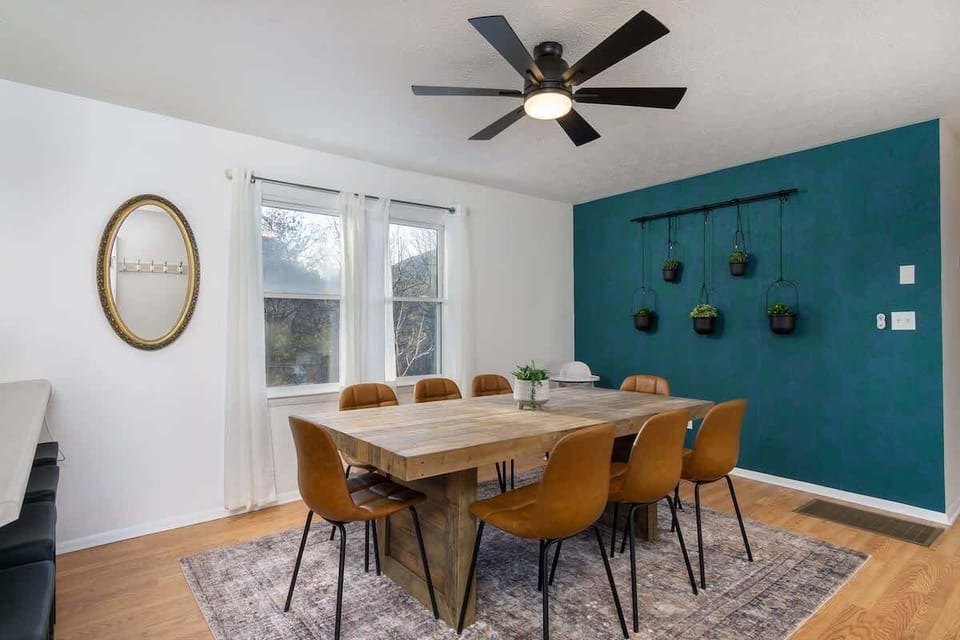 Dining table for 8 and 3 additional barstools in the kitchen