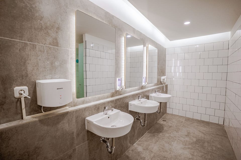 Shower, free toiletries, hair dryer, slippers