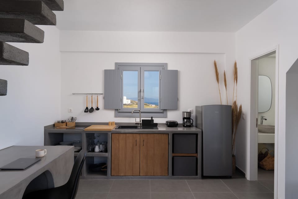 Honeymoon Maisonette Suite with private balcony and Sea View | Private kitchen | Fridge, stovetop, coffee/tea maker, electric kettle