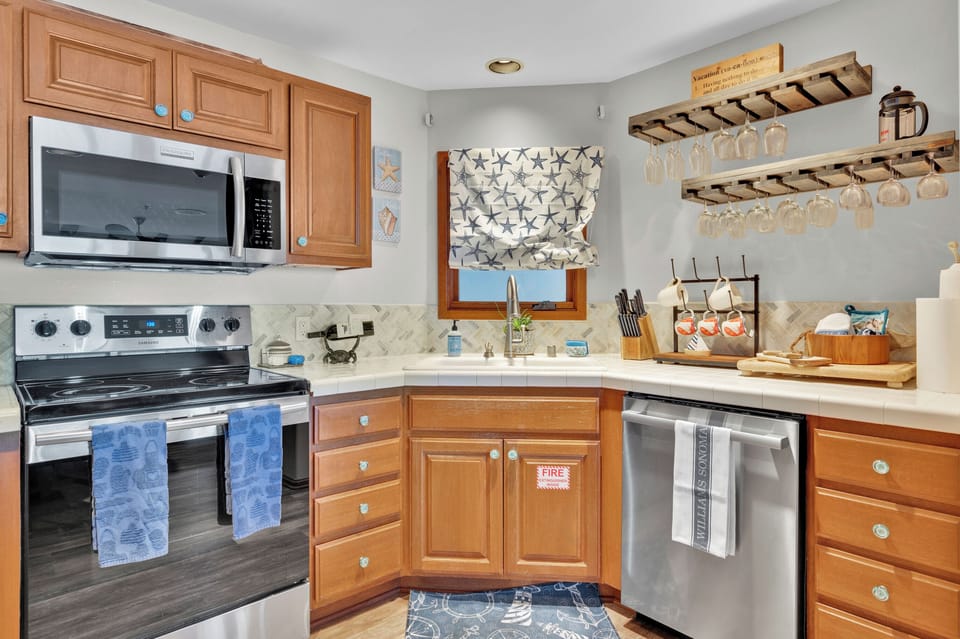 Updated kitchen with new stainless steel appliances. 