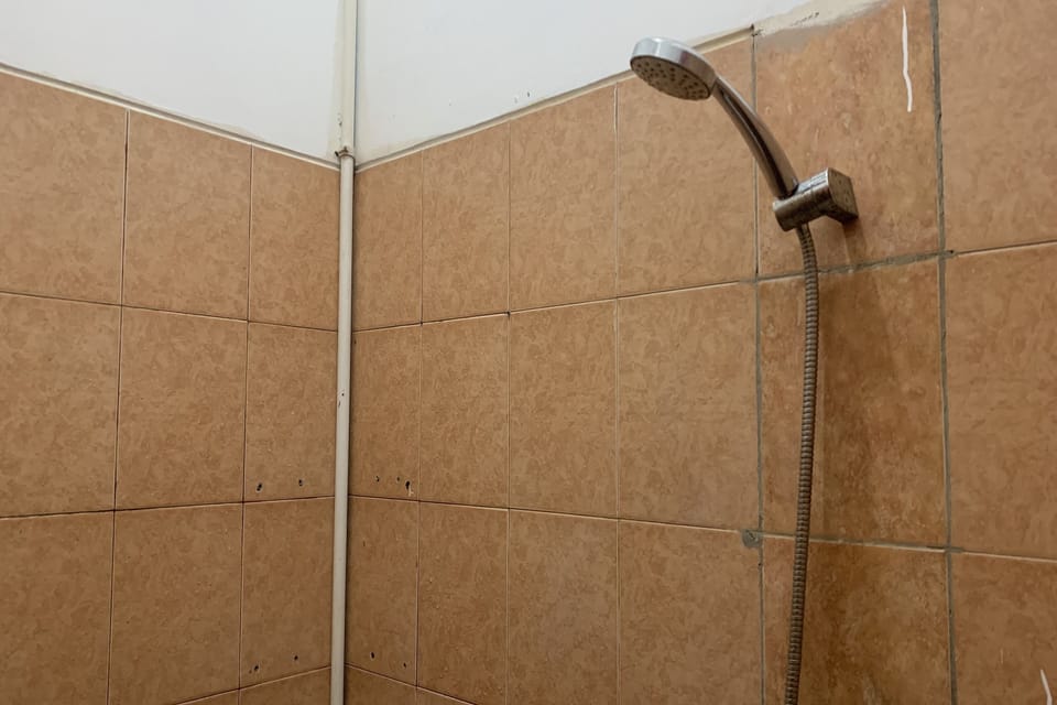 Standard Room | Bathroom | Shower, rainfall showerhead, free toiletries, slippers