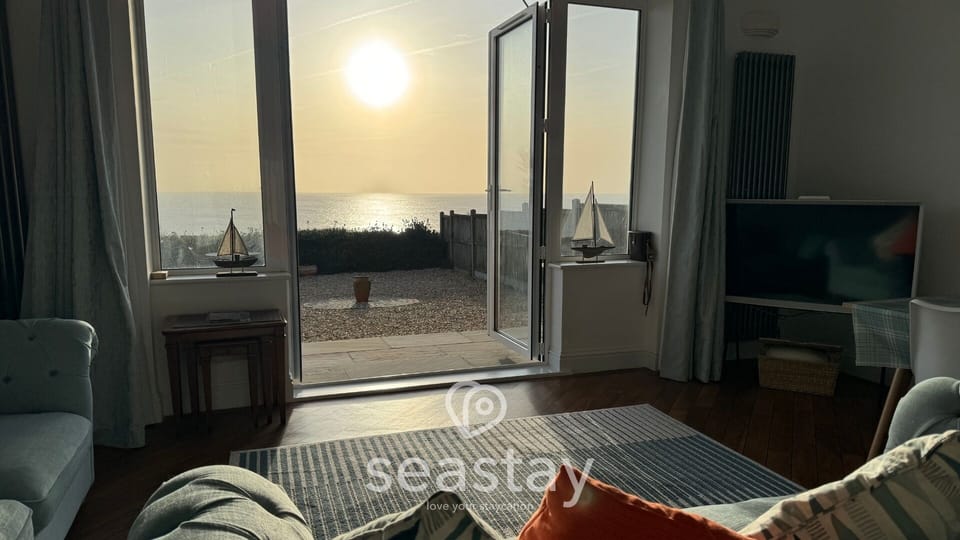 Sunrise with lounge doors open - Goodwins Seaview Apartment Broadstairs Kent - seastay.co.uk
