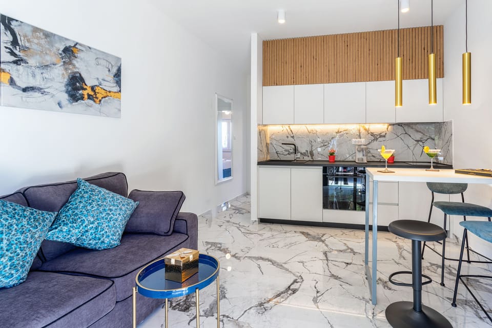 Fridge, electric kettle, cookware/dishes/utensils
