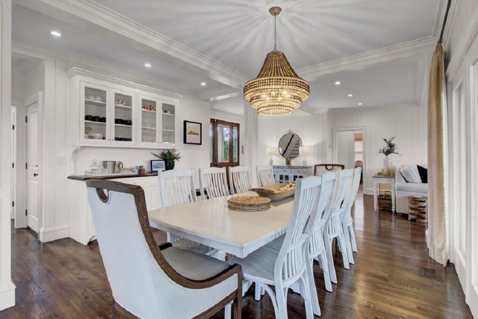 - Host unforgettable meals around this stunning 10 seat dining table - Show stopping chandelier sets the mood for everything from brunch to celebrations - Bright, polished, and ready for family feasts or laughter filled dinner parties