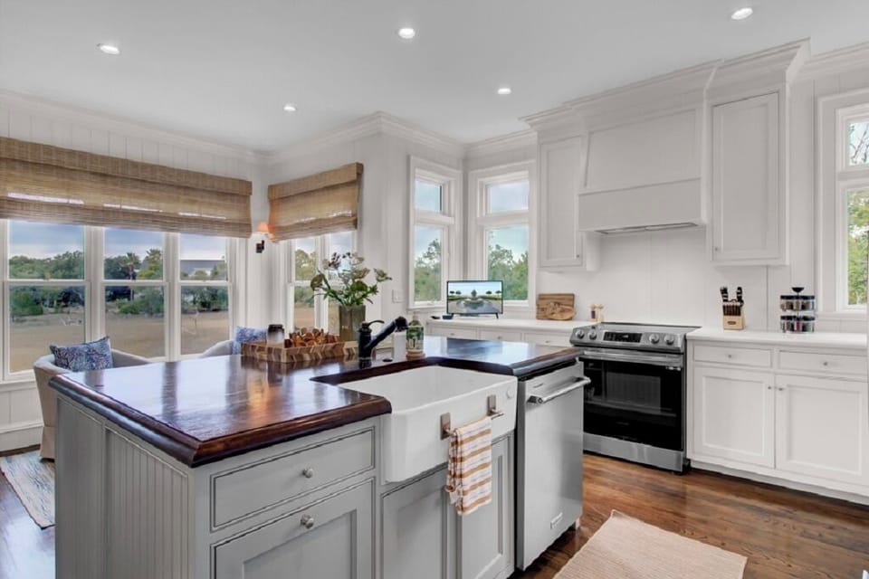 - Whip up vacation meals in this dreamy kitchen bathed in natural light - Farmhouse sink and butcher block counters bring style and charm to every dish - Cook, chat, and sip wine, all while taking in peaceful views from every angle