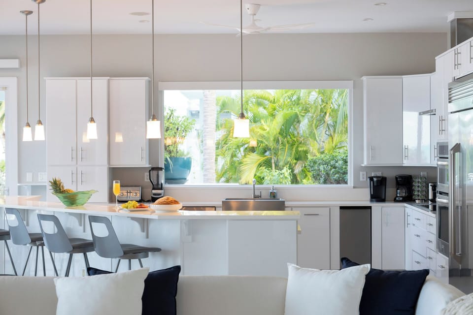 Countertop appliances include a blender, toaster, plus a Keurig and drip coffee maker. 