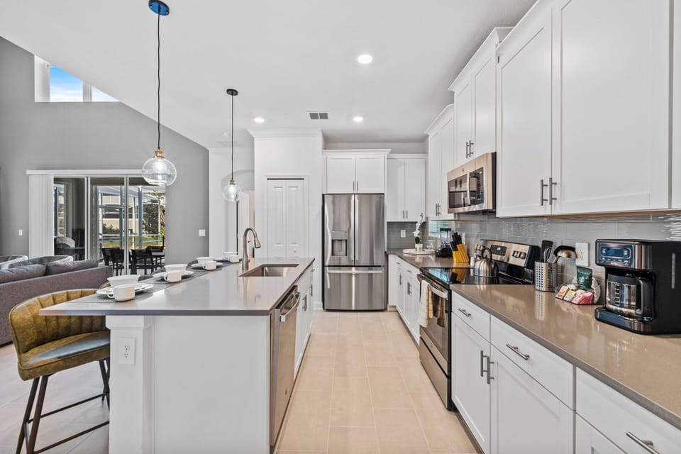 Amazing Kitchen of the Home in Davenport Florida - Step into a world of culinary sophistication with open-concept kitchen - Meticulously furnished for your comfort