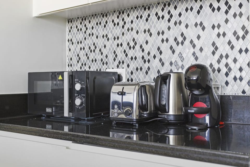 Luxury Apartment | Private kitchen | Microwave, oven, cookware/dishes/utensils