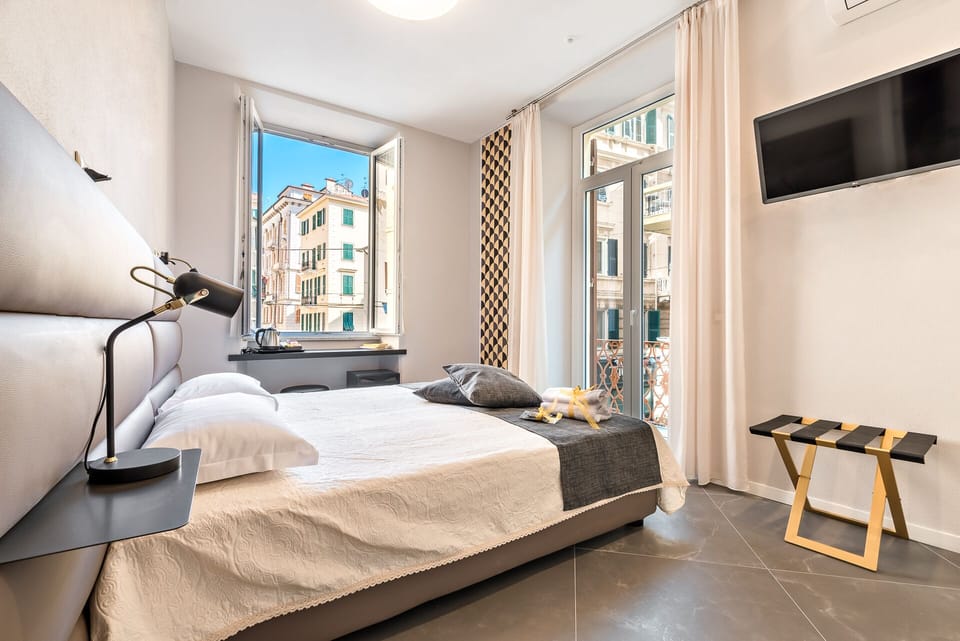 Deluxe Double or Twin Room | Minibar, in-room safe, desk, laptop workspace