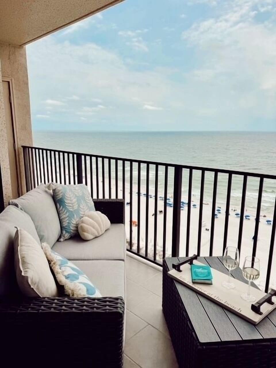 Relax on the comfortable seating while enjoying refreshing drinks and captivating views of the coastline below