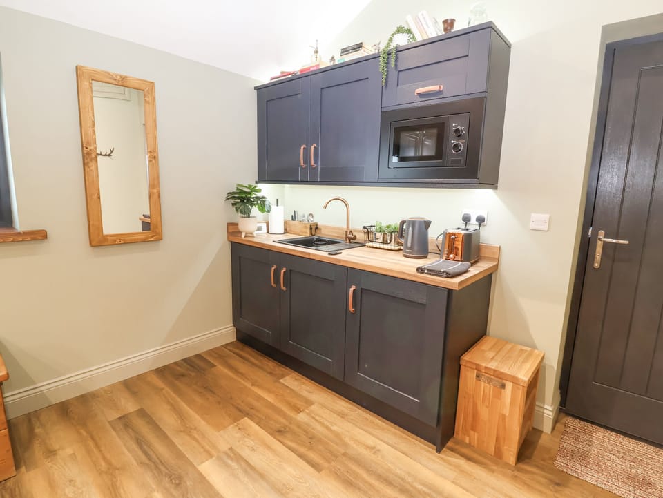 Fridge, electric kettle, toaster, cookware/dishes/utensils