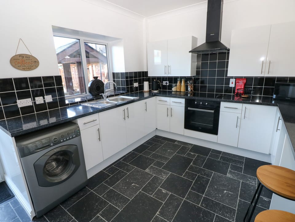 Fridge, electric kettle, toaster, cookware/dishes/utensils