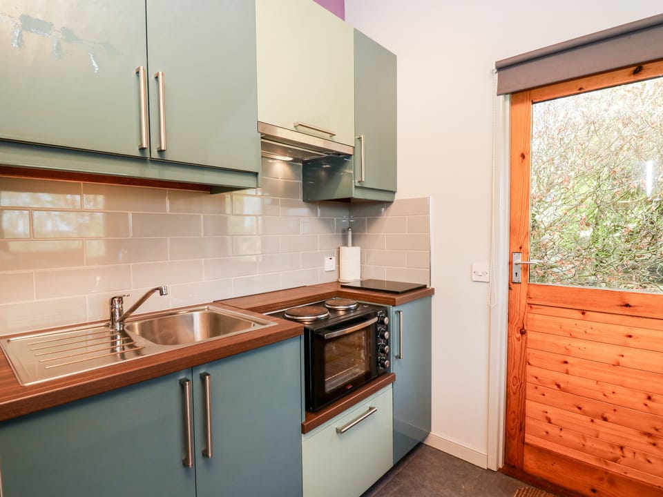Fridge, electric kettle, toaster, cookware/dishes/utensils