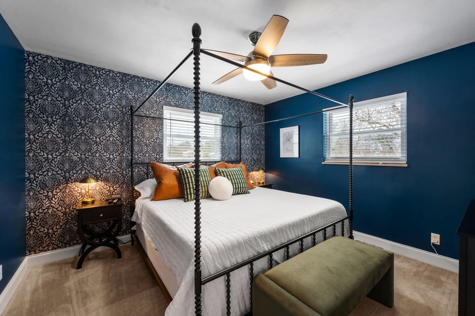 Sleep under the canopy bed frame after a full day of everyone else's noise.